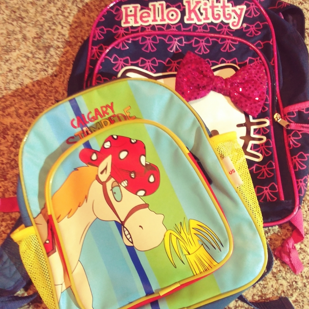 Two 4 One backpacks Hello Kitty and Calgary Stampede